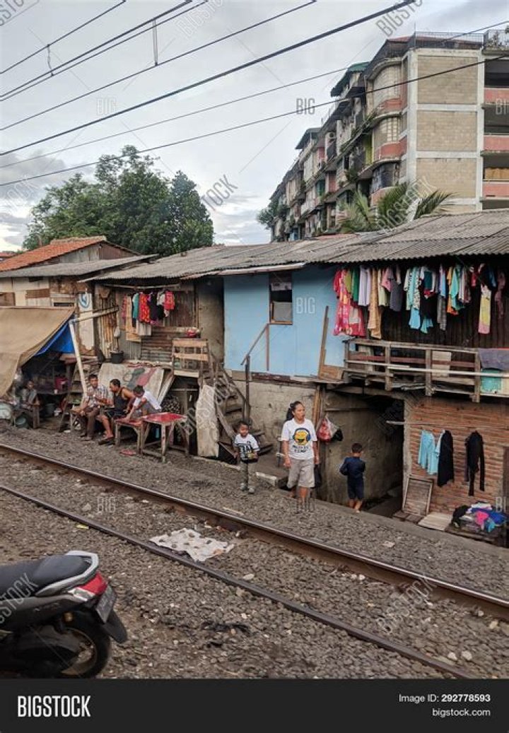 Where are slums found in Indonesia?