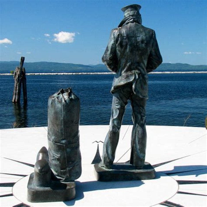 Where is the original Lone Sailor statue located?