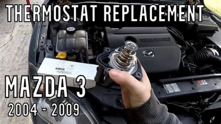 Where is the thermostat on a Mazda Bongo?