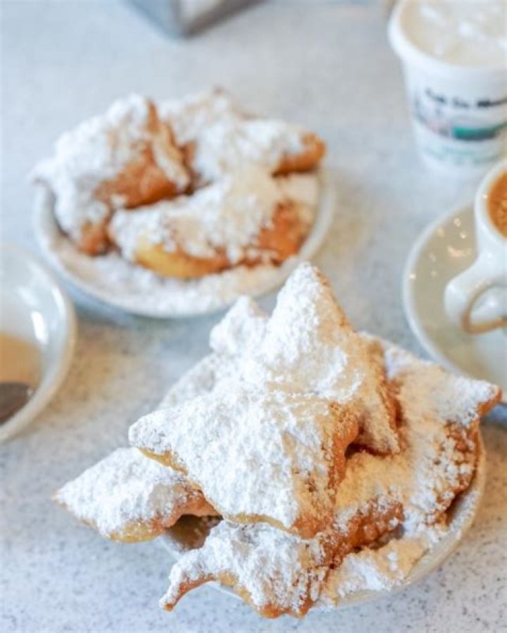 Who is famous for beignets in New Orleans?