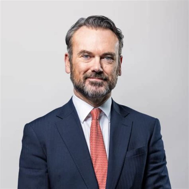 Who is the CEO of Tesco Bank?