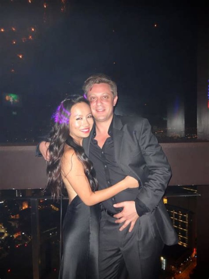 Why does Anton Kreil live in Singapore?