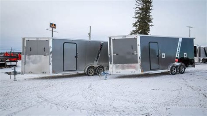 Will a side by side fit on a snowmobile trailer?